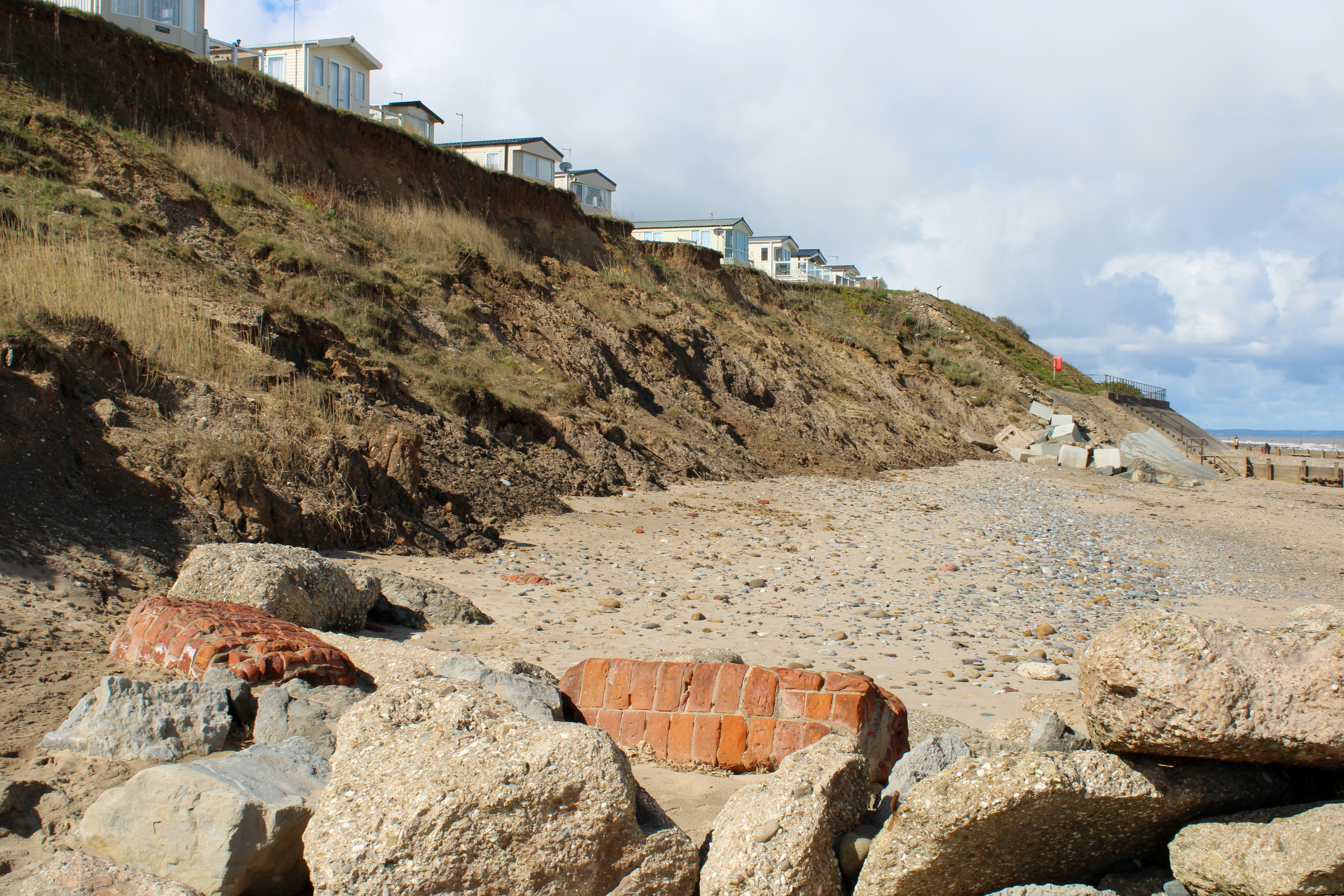 Sandy beach and eroding cliffs at Hornsea on the East Yorkshire coast